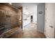 Large bathroom showcasing a walk-in tiled shower and a long, bright vanity with mirrors at 149 Avalon Way, Sharpsburg, GA 30277