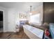 Modern bathroom featuring a freestanding tub, stylish fixtures, and tile accents that enhance the bright space at 149 Avalon Way, Sharpsburg, GA 30277