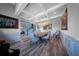 Dining room featuring decorative ceiling, modern chandelier, and hardwood floors at 149 Avalon Way, Sharpsburg, GA 30277