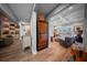 Hallway view featuring a wine storage unit and views to various rooms at 149 Avalon Way, Sharpsburg, GA 30277