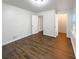 Spacious bedroom featuring hardwood flooring and two entryways at 1641 Pendley Dr, Austell, GA 30168