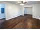 Living room featuring hardwood floors and ceiling fan at 1641 Pendley Dr, Austell, GA 30168