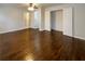 Main bedroom featuring hardwood floors, ceiling fan, and ensuite bathroom at 1641 Pendley Dr, Austell, GA 30168