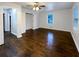 Large main bedroom featuring hardwood floors, a ceiling fan, and ample natural light at 1641 Pendley Dr, Austell, GA 30168