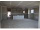 Interior view showcasing the open concept layout, drywall, and window placement during construction at 1975 William Glen St, Dacula, GA 30019