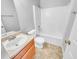 Clean bathroom with a shower-tub combo and a single sink vanity at 3414 Bench Ave, Atlanta, GA 30349