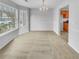 Bright dining room with a chandelier and view to the kitchen at 3414 Bench Ave, Atlanta, GA 30349