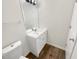 Clean bathroom featuring a modern vanity with storage and a well-maintained toilet at 61 Barrington Pl, Marietta, GA 30066