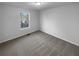 Neutral bedroom with natural light and carpeting at 61 Barrington Pl, Marietta, GA 30066