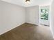 Cozy bedroom features neutral walls, carpet, one window and closet at 61 Barrington Pl, Marietta, GA 30066