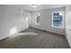 Neutral bedroom with carpet, window, and light walls at 61 Barrington Pl, Marietta, GA 30066