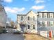 Charming two-story home featuring a welcoming blue front door and well-maintained landscaping at 61 Barrington Pl, Marietta, GA 30066