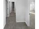 Hallway with neutral walls and carpet leads to other rooms at 61 Barrington Pl, Marietta, GA 30066