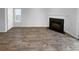 Living room showcasing hardwood floors and a cozy fireplace at 61 Barrington Pl, Marietta, GA 30066