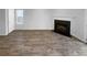 Spacious living room showcasing hardwood floors and a cozy fireplace at 61 Barrington Pl, Marietta, GA 30066