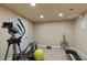Basement gym space with neutral wall colors, carpeted floors, and access to workout equipment at 3130 Kates Nw Way, Kennesaw, GA 30152