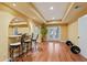 Open basement with tiled floors, bar, french doors, and access to the backyard at 3130 Kates Nw Way, Kennesaw, GA 30152