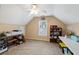 Bonus room with window, desk, and ceiling fan at 3130 Kates Nw Way, Kennesaw, GA 30152