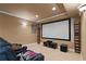Spacious home theater with a large screen, comfortable seating, and ample space for movie nights at 3130 Kates Nw Way, Kennesaw, GA 30152