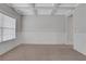 Living room with neutral carpet, crown molding, and coffered ceiling at 3808 The Great Dr, Atlanta, GA 30349