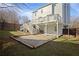 A large backyard featuring a deck and patio area, ready for outdoor enjoyment at 4085 Amberly Nw Grn, Kennesaw, GA 30144