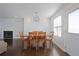 Dining room featuring hardwood floors with wood table and chairs at 4085 Amberly Nw Grn, Kennesaw, GA 30144