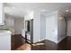 Open-concept kitchen area with modern appliances and stylish cabinetry at 4085 Amberly Nw Grn, Kennesaw, GA 30144