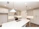 Kitchen featuring an oversized island with seating and stainless appliances at 704 Dodd Ln # 158, Buford, GA 30518