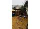 Backyard showcasing the stone walkway and wooden fence at 3008 Stockbridge Way, Dacula, GA 30019
