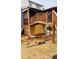 Photo showcases the backyard with the wooden deck, yard decor, and ladder at 3008 Stockbridge Way, Dacula, GA 30019