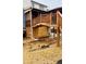 Backyard deck with wooden stairs and an outdoor area, offering a comfortable outdoor space at 3008 Stockbridge Way, Dacula, GA 30019