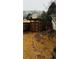 Backyard showcasing the stone walkway and wooden fence at 3008 Stockbridge Way, Dacula, GA 30019