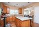 Open-concept kitchen with stainless steel appliances and a large island at 3008 Stockbridge Way, Dacula, GA 30019