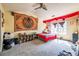 Bedroom with large window and eclectic decor at 485 Lantern Wood Dr, Scottdale, GA 30079