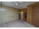 Bedroom with carpet floors, natural light, ceiling fan and ample closet space at 559 Quail Trail Rd, Auburn, GA 30011