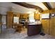 Cozy kitchen and dining area featuring tile and carpet flooring at 559 Quail Trail Rd, Auburn, GA 30011