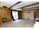 Carpeted living room featuring beamed ceilings and natural light at 559 Quail Trail Rd, Auburn, GA 30011