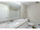 Bathroom featuring granite counters, a large mirror and a toilet at 3225 Redona Dr, Atlanta, GA 30349