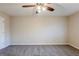 Spacious bedroom featuring a ceiling fan and neutral carpet at 3225 Redona Dr, Atlanta, GA 30349