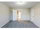 Bedroom with fresh grey carpet and two white doors at 3225 Redona Dr, Atlanta, GA 30349