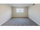 Bedroom featuring a window and neutral carpet at 3225 Redona Dr, Atlanta, GA 30349