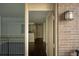 Inviting entryway featuring a warm color palette and a glimpse into the modern kitchen at 620 Peachtree Ne St # 502, Atlanta, GA 30308