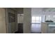 View of a living area looking into the kitchen and balcony at 620 Peachtree Ne St # 502, Atlanta, GA 30308