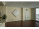 Spacious living room with hardwood floors and access to the balcony at 620 Peachtree Ne St # 502, Atlanta, GA 30308