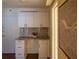 Built in office featuring granite countertop, storage drawers and cabinets at 620 Peachtree Ne St # 502, Atlanta, GA 30308