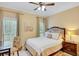 Charming bedroom with natural light, decorative accents, and a comfortable bed at 1355 Zephyr Ct, Cumming, GA 30041