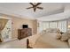 Cozy main bedroom features a tray ceiling, natural light, and neutral decor at 1355 Zephyr Ct, Cumming, GA 30041