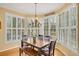 Breakfast nook features natural light, and wood floors, perfect for casual dining at 1355 Zephyr Ct, Cumming, GA 30041