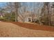 Two-story brick home with inviting front entrance on a well-maintained, mulched lawn at 1355 Zephyr Ct, Cumming, GA 30041