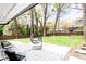 Inviting backyard patio with egg chair and modern black and white outdoor rug, perfect for relaxing and entertaining at 2047 Seavey Dr, Decatur, GA 30032